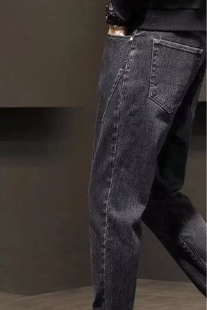 Relaxed fit straight leg jeans in black denim with a classic five-pocket design.