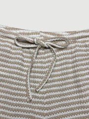 Maternity wide leg pants in apricot and white stripe with drawstring waist.