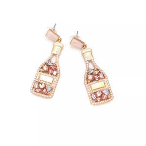 Champagne bottle drop earrings with pink and clear crystals and a champagne color finish.