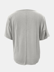 Gray relaxed fit dolman sleeve tee with textured fabric and center back seam.
