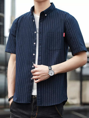 Navy blue striped short sleeve button-up shirt with a chest pocket and white undershirt.