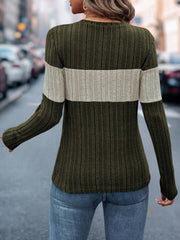 Moss green ribbed crewneck sweater with a cream colorblock stripe.