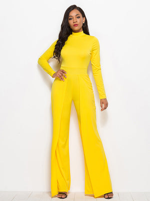 Yellow high-waisted palazzo jumpsuit with long sleeves and front slit pants.