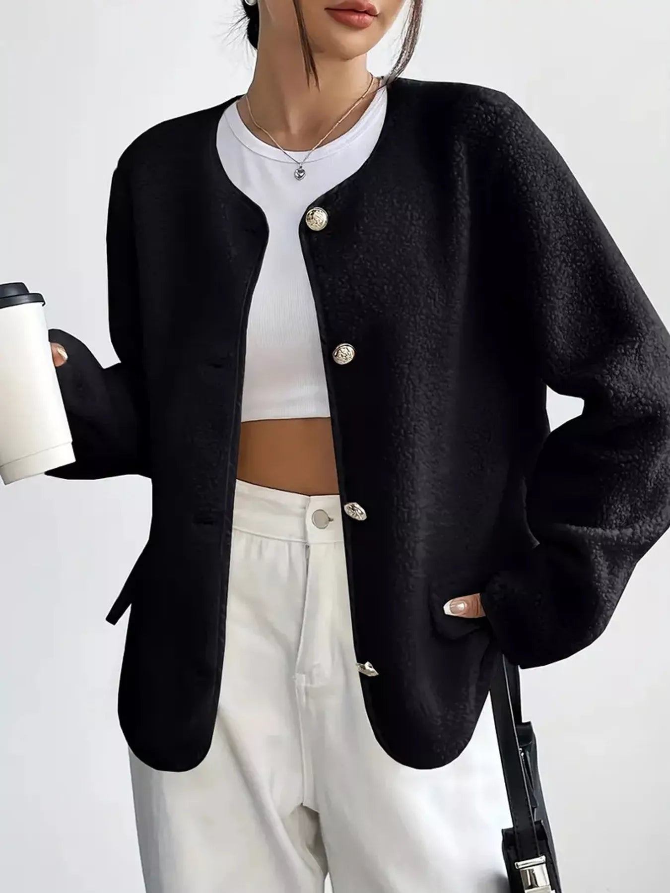 Black textured button-up fleece jacket with round neckline and gold-tone buttons.