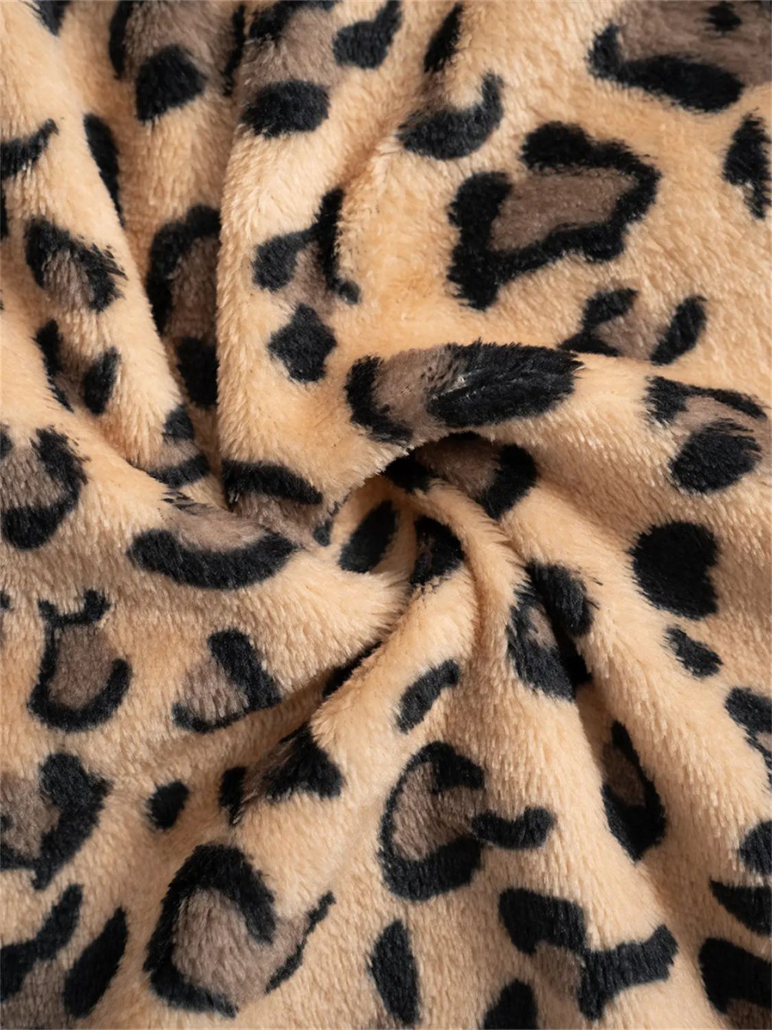 Leopard print lounge palazzo trousers in plush fabric with a bow detail.
