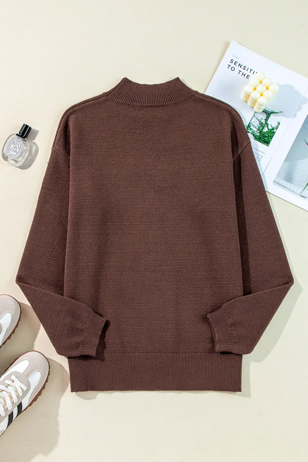 Brown mock neck sweater with ribbed cuffs and hem