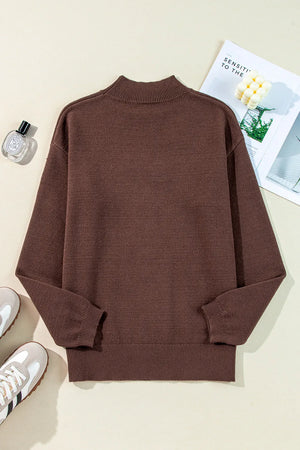 Brown mock neck sweater with ribbed cuffs and hem