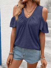 Navy blue ruched cold shoulder t-shirt with v-neck and flutter sleeves.