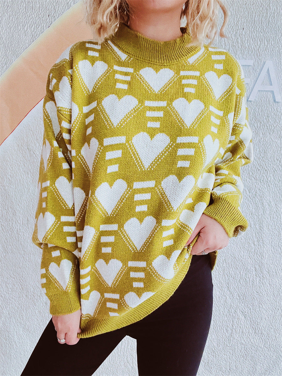 Mustard geometric heart jacquard knit jumper with mock neck and long sleeves.
