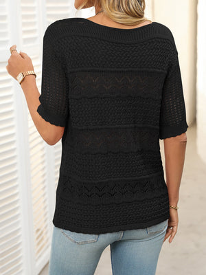Black half-sleeve knit sweater with openwork patterns and scalloped cuffs.