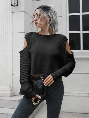 Black ribbed knit cold shoulder sweater with long sleeves.