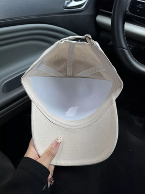 Khaki cotton baseball cap, inside view, adjustable strap detail