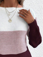 Colorblock ribbed knit sweater with boatneck and burgundy sleeves.