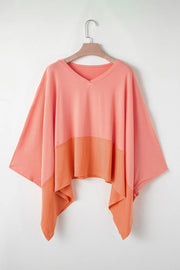 Colorblock drape batwing blouse in sherbet with V-neck and asymmetrical hem