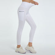 White pocketed sculpt leggings with a zippered pocket detail.