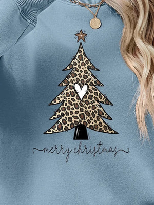 Misty Blue sweatshirt with leopard print Christmas tree graphic and Merry Christmas text.