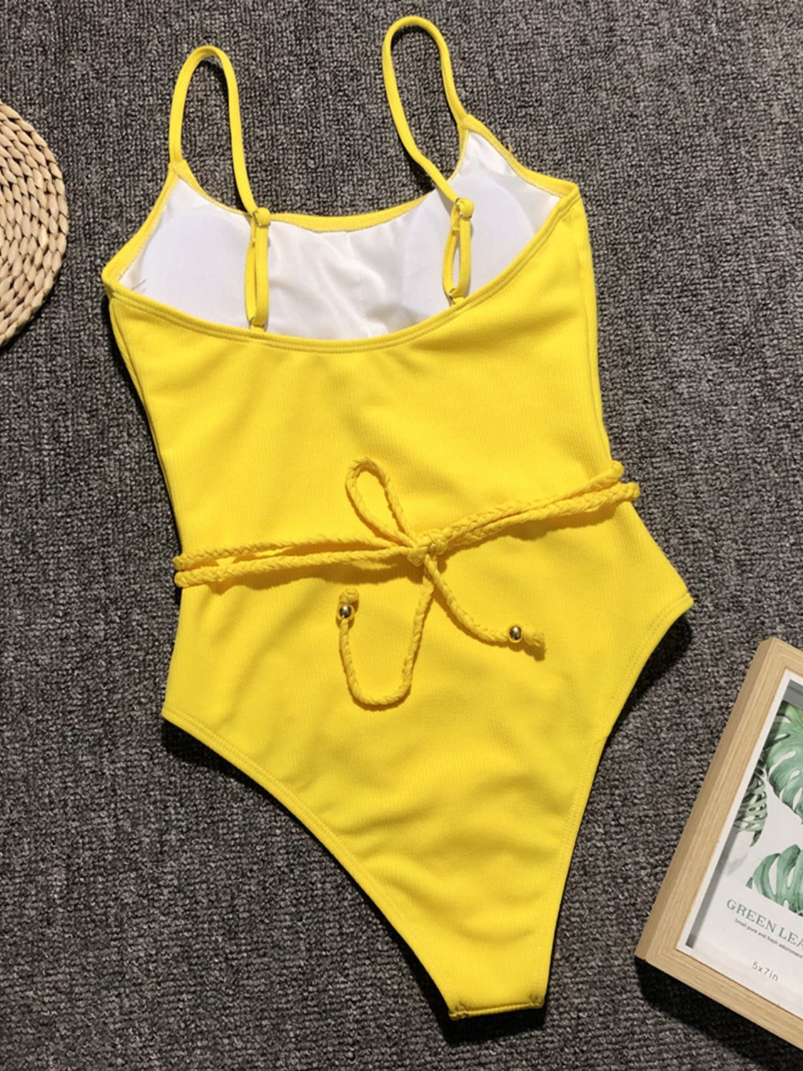 Yellow ribbed one-piece swimsuit with braided waist tie and adjustable straps