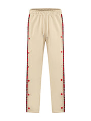 Men's Khaki sweatpants with red plaid snap-button trim and drawstring waist.