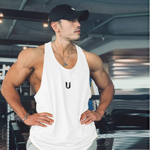 White performance scoop neck tank top with black logo detail