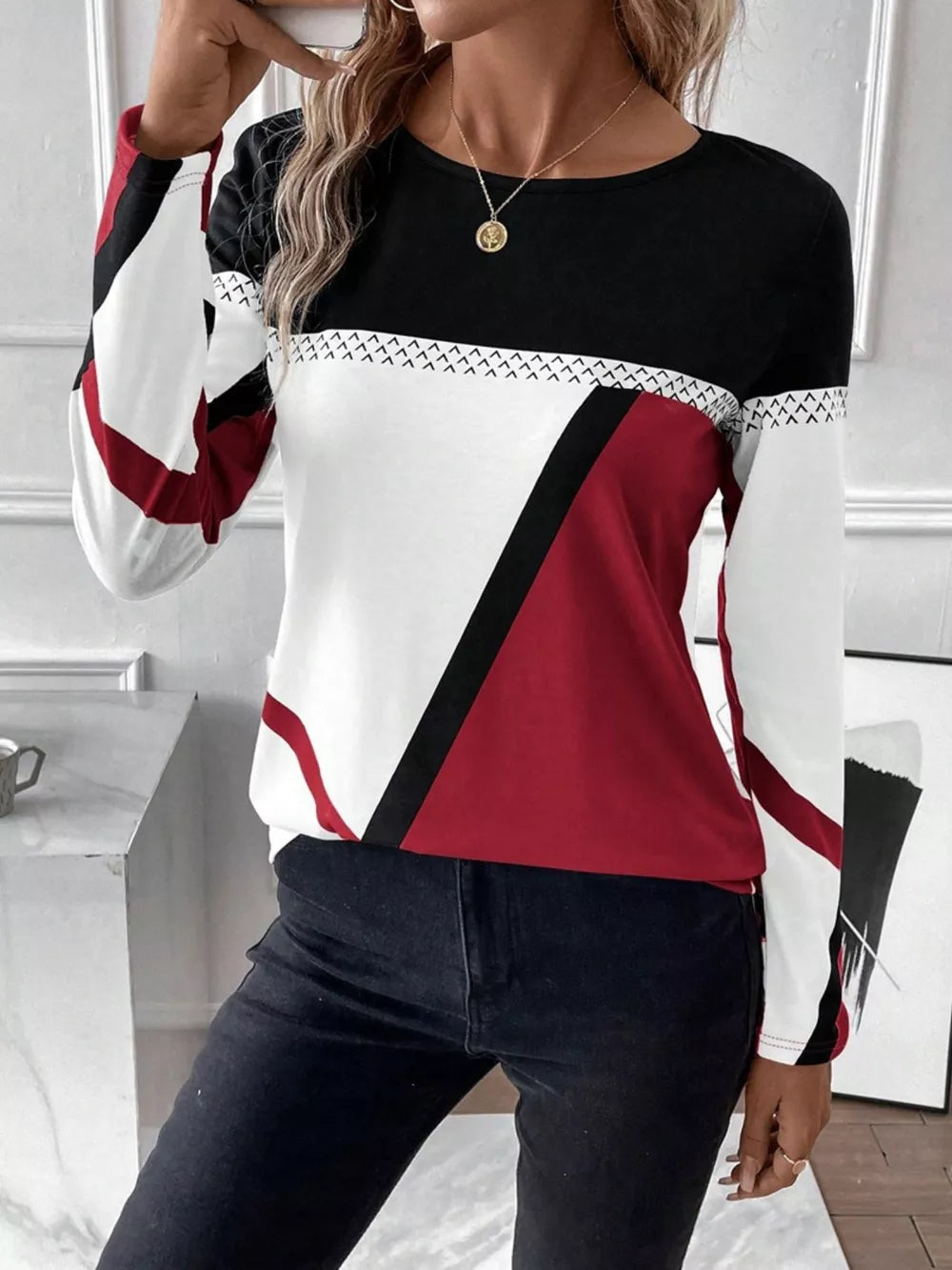 Geometric panel long sleeve t-shirt in black, white, and scarlet with chevron detail