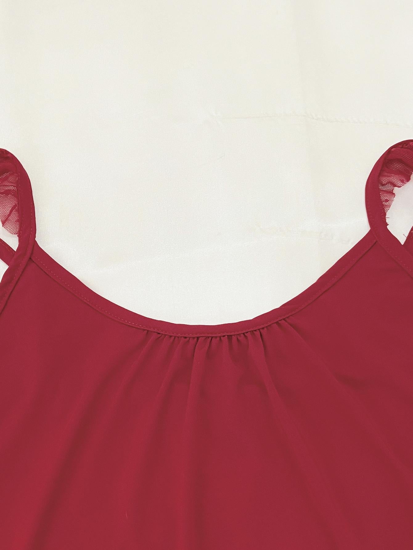 Red loungewear set with ruffled mesh trim straps and gathered neckline.