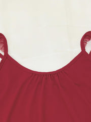 Red loungewear set with ruffled mesh trim straps and gathered neckline.