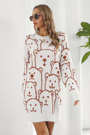 White knit dress with allover brown bear motif, crew neck, long sleeves.