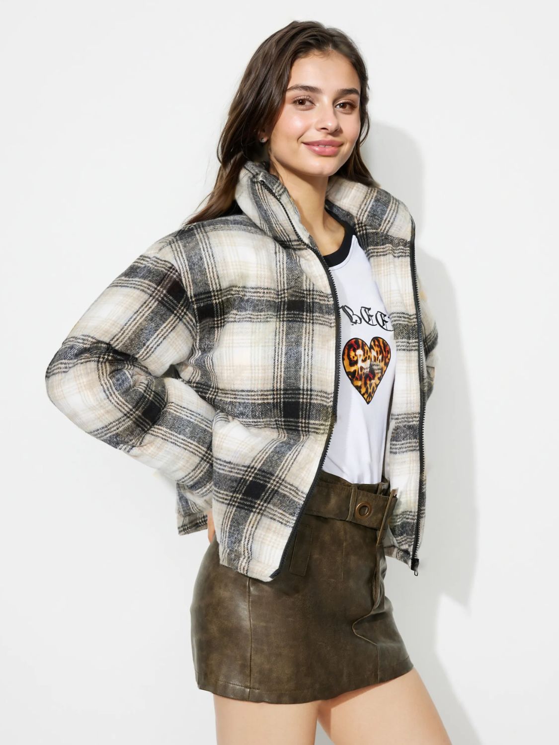 Plaid puffer jacket in gray with a stand-up collar and zip front.
