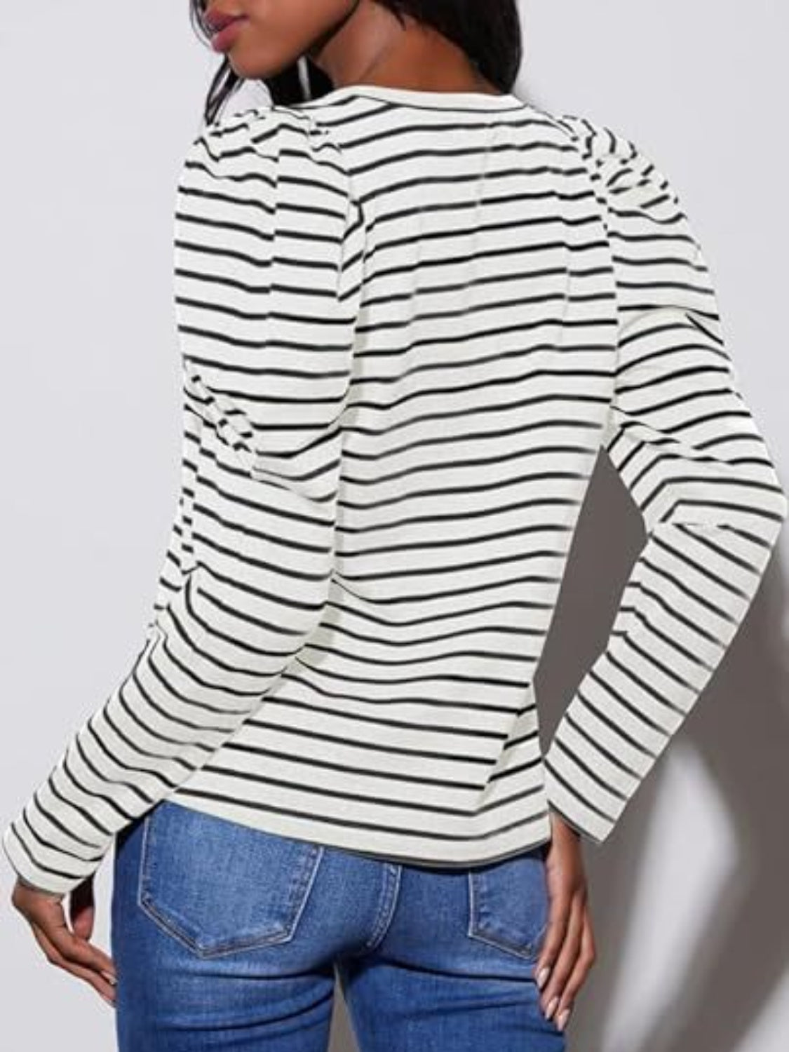 White and black striped tee with puff sleeves and crew neck, shown from the back.