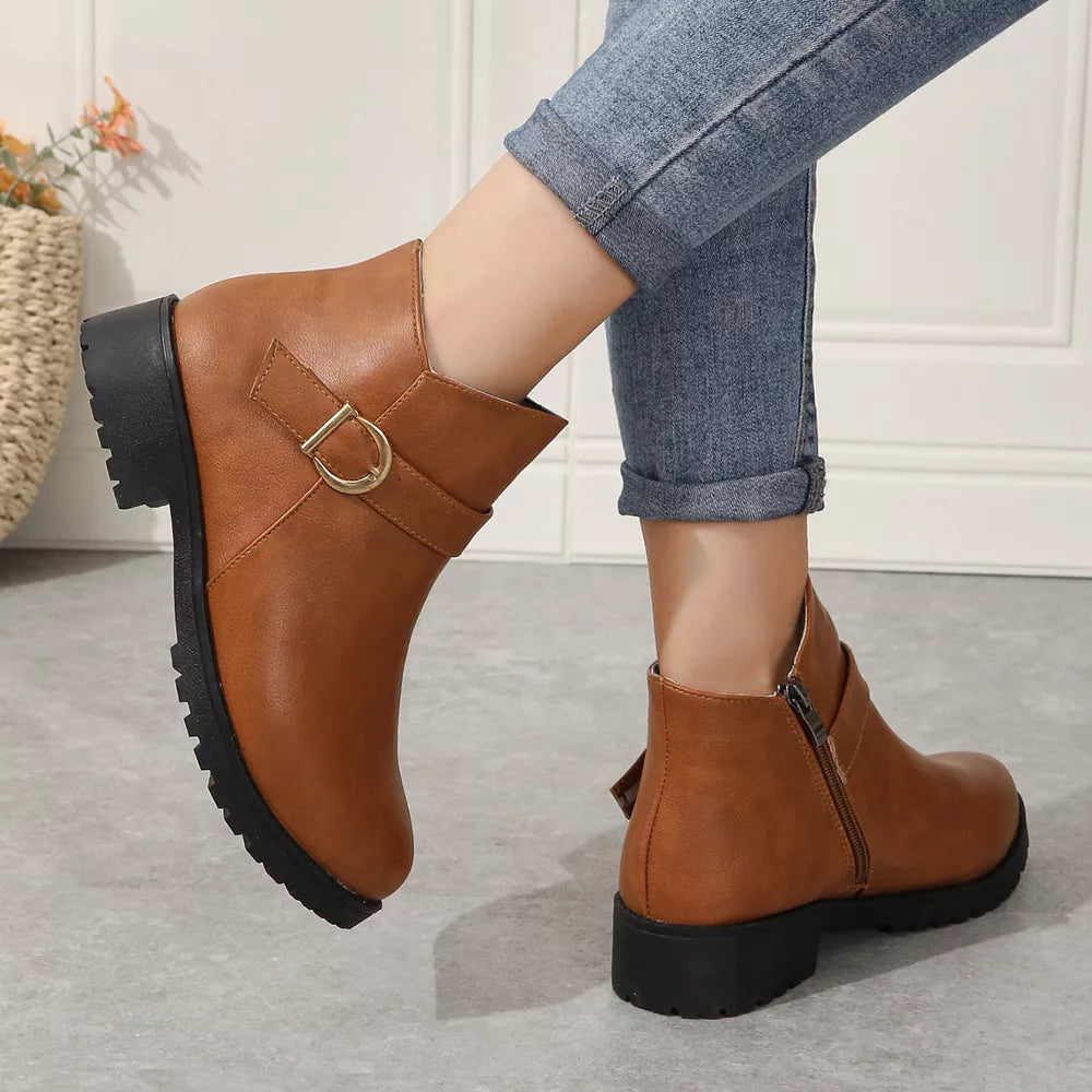 Caramel buckle ankle boots with block heel and side zipper.