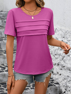 Fuchsia pink jersey top with pleated bodice detail and short sleeves.