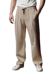 Khaki textured drawstring casual sweatpants for men with a waffle knit pattern.