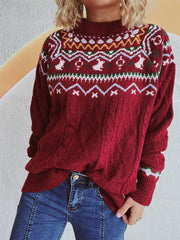 Burgundy Fair Isle cable knit turtleneck sweater with a festive pattern and textured sleeves.