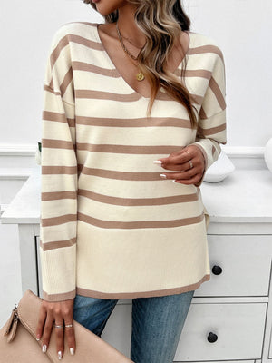 Oversized cream and tan stripe V-neck knit sweater with ribbed hem and cuffs