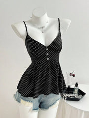 Black polka dot peplum cami with spaghetti straps and button detail