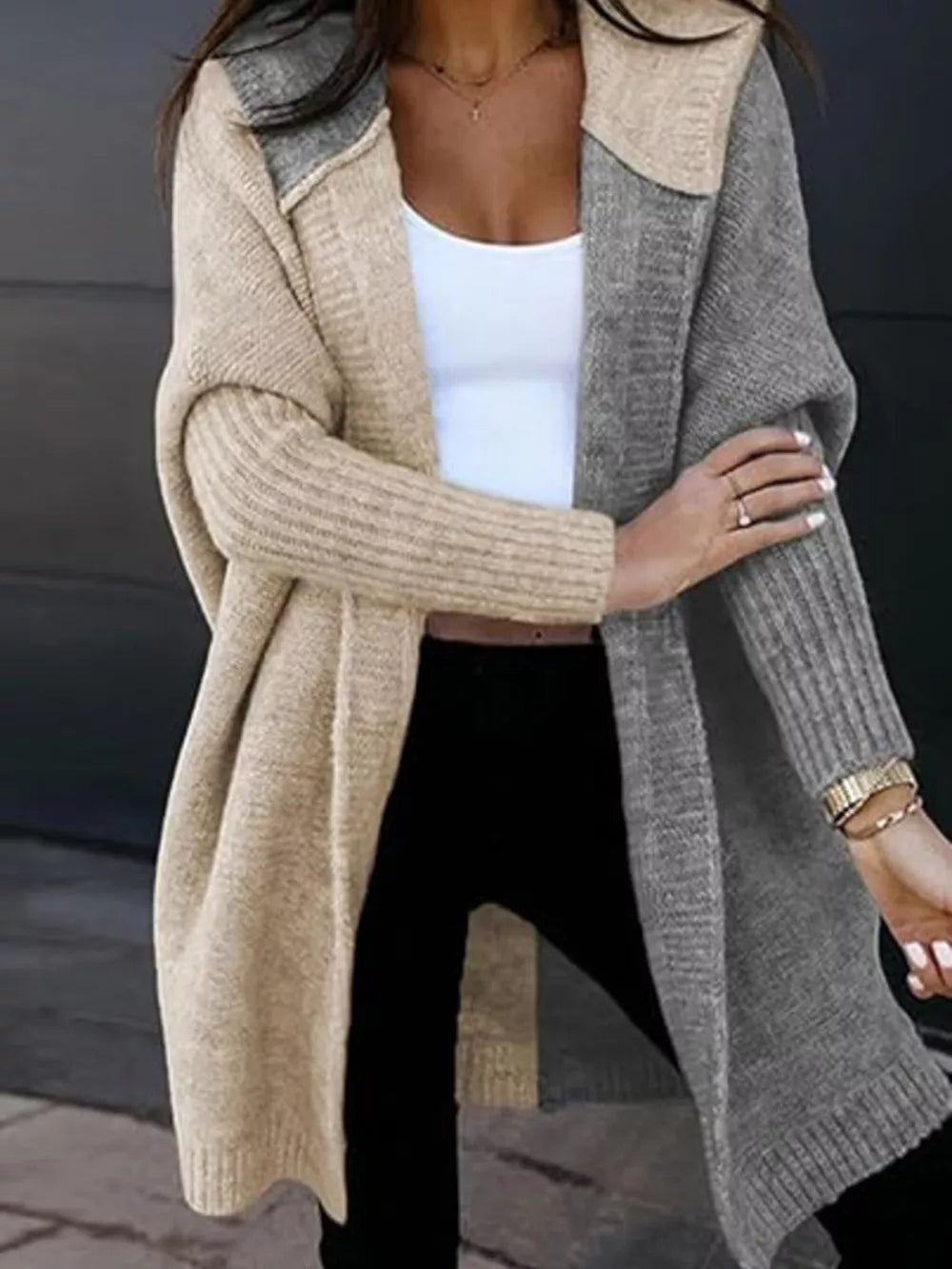 Two-tone hooded knit cardigan in camel and gray acrylic with ribbed sleeves and hem.