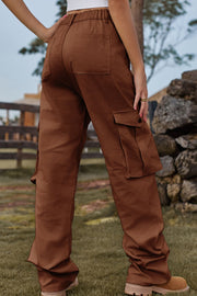 Brown utility wide-leg cargo pants with multiple pockets and a relaxed fit.