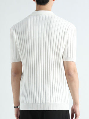 White ribbed knit polo shirt with short sleeves and a collar.