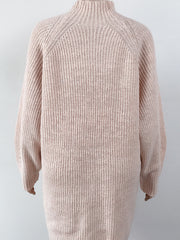 Ribbed knit cocoon turtleneck dress in blush pink with long sleeves and a relaxed fit.