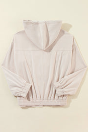 Cream corduroy bomber hoodie with relaxed fit, elastic cuffs and hem