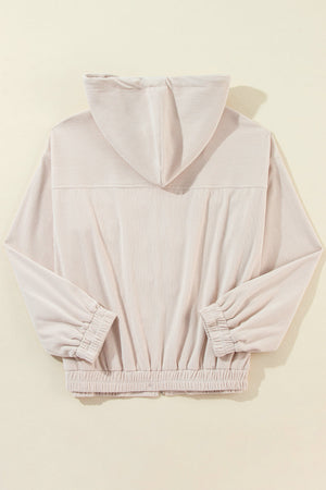 Cream corduroy bomber hoodie with relaxed fit, elastic cuffs and hem