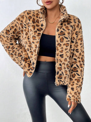 Leopard print faux fur bomber jacket in camel with zip front and stand-up collar.