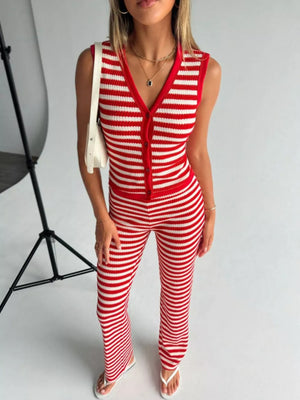 Red and white striped knit V-neck buttoned sleeveless top and flared pants set.