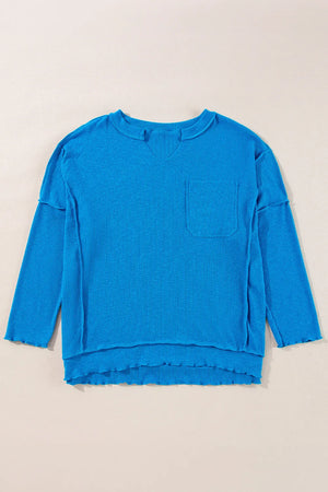 Textured blue thermal top with cutout neckline and chest pocket