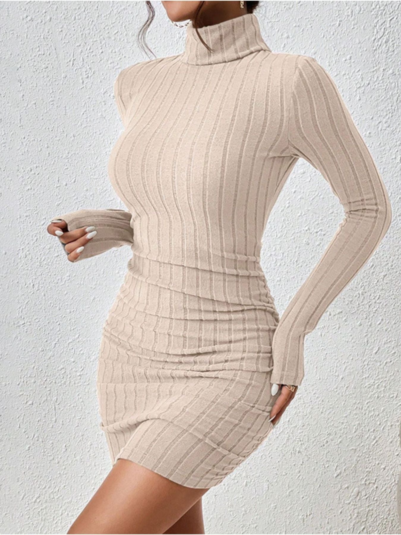 Apricot ribbed turtleneck bodycon mini dress with ruched detail