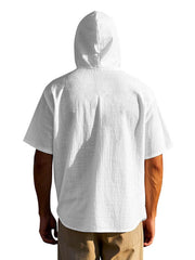 Men's white short sleeve hooded shirt with button detail and pocket.