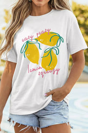 White polyester t-shirt with a graphic of three yellow lemons and text that says "easy peasy lemon squeezy".