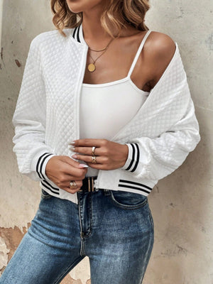 White quilted bomber jacket with striped ribbing on cuffs and collar.