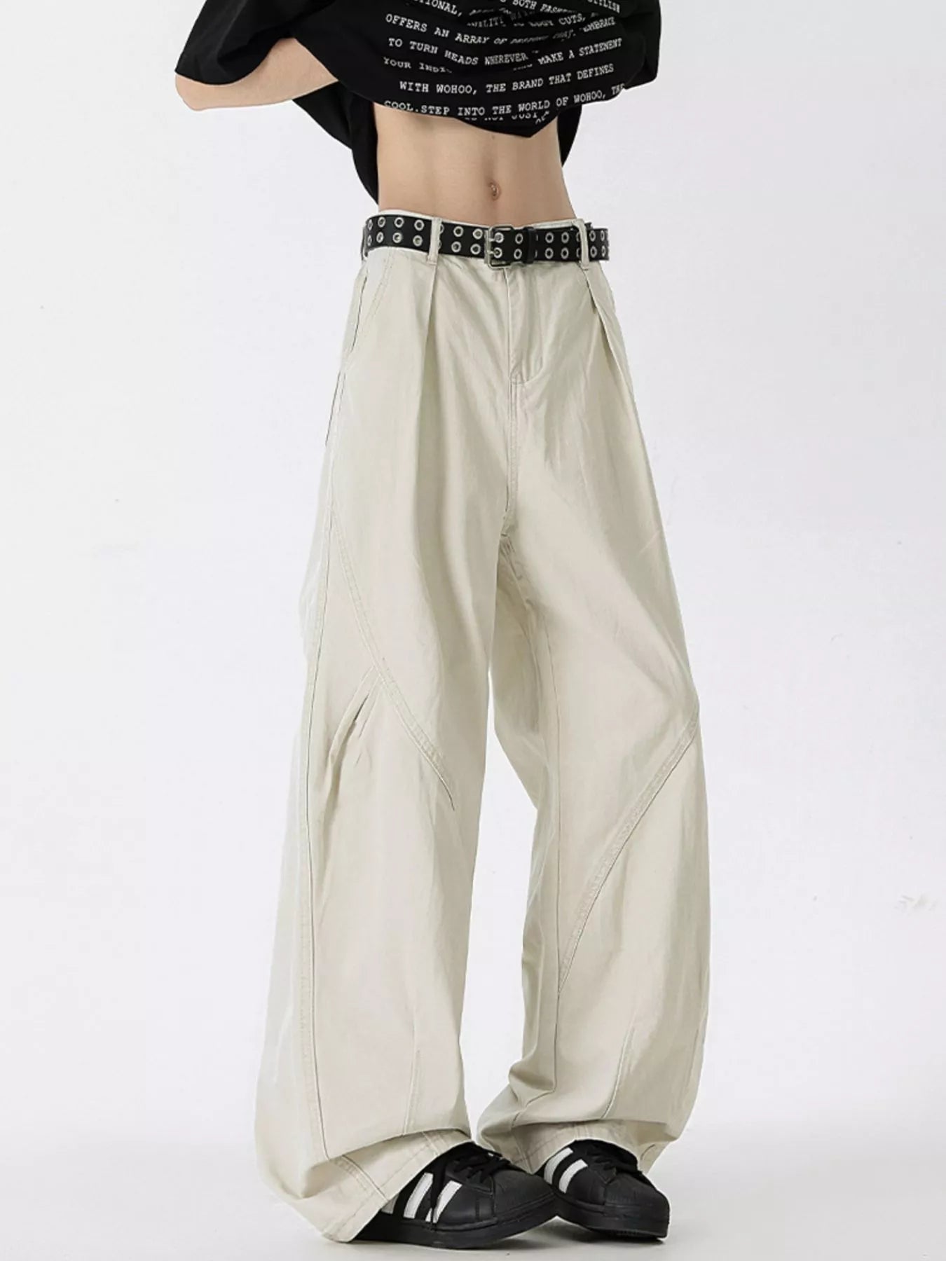 Men's oversized wide-leg jeans in off-white, 100% cotton, with a relaxed fit and unique seam details.