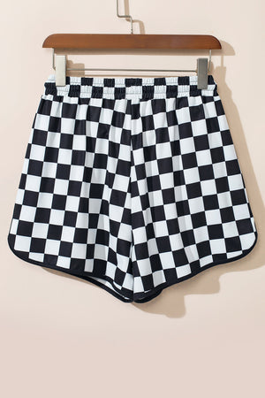 Black and white checkerboard lounge shorts with black trim and elastic waistband.